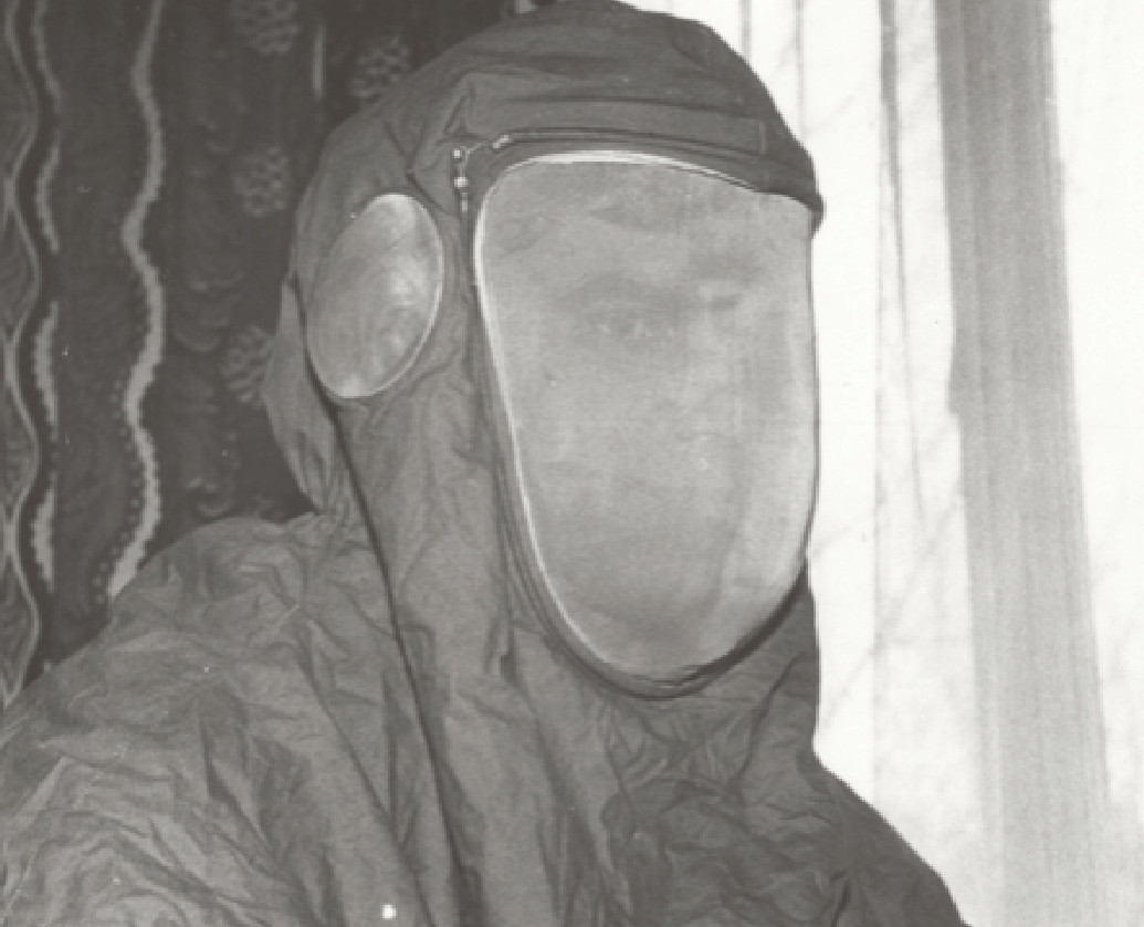 Hood with face shield of the OM-1 suit