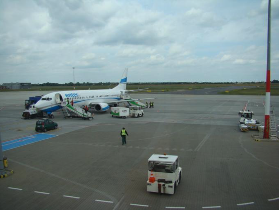 Boeing B.737 airplane from the charter airline Enter Air on the platform of Ławica Airport. 2012 year. Photo by Karol Placha Hetman