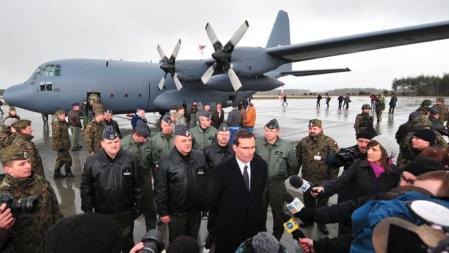 The first C-130 E Hercules nb 1501 in the Polish Army. Among the guests is the US Ambassador. Powidz 2009-03-24. Photo by PSP