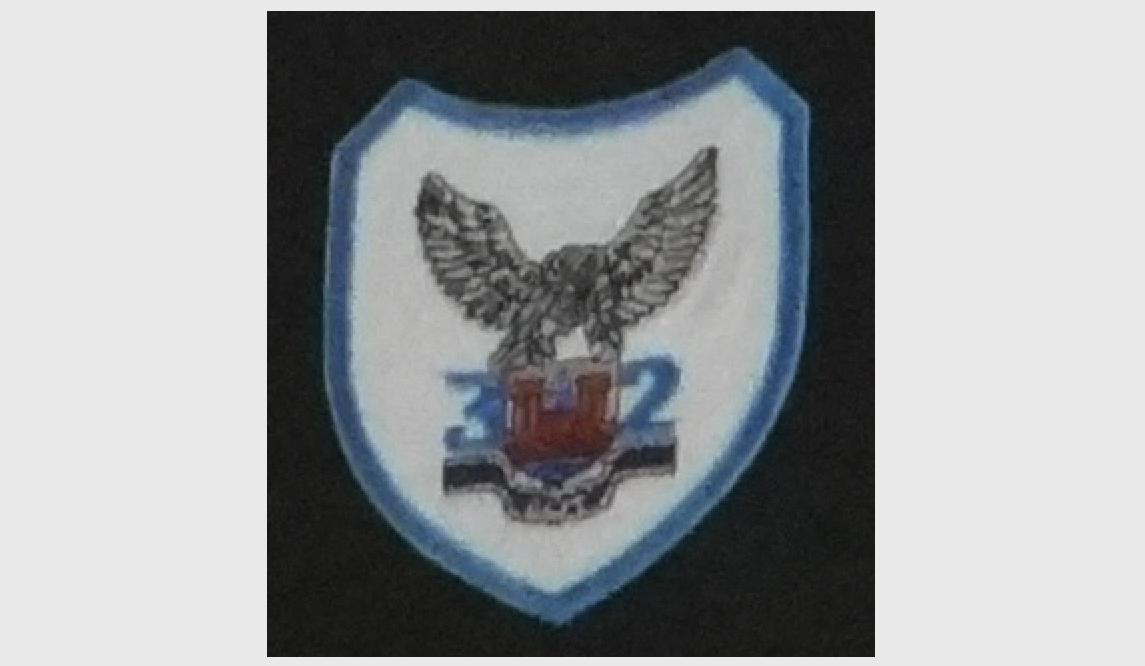 Godło 32 Pułku Lotnictwa Rozpoznania Taktycznego