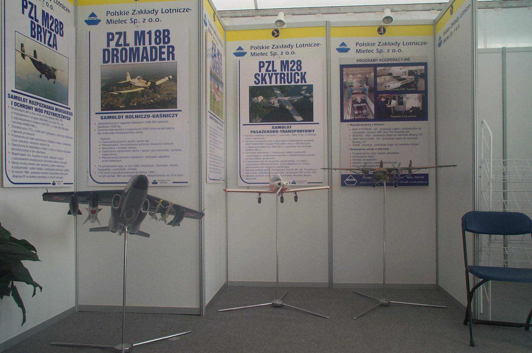 Model I-22 Iryda M-93M nb 0301 and M-26 Iskierka and M-28 Bryza. PZL Mielec marketing stand at the Air Show in Radom 2002. Photo by Dawid Kasprzyk.