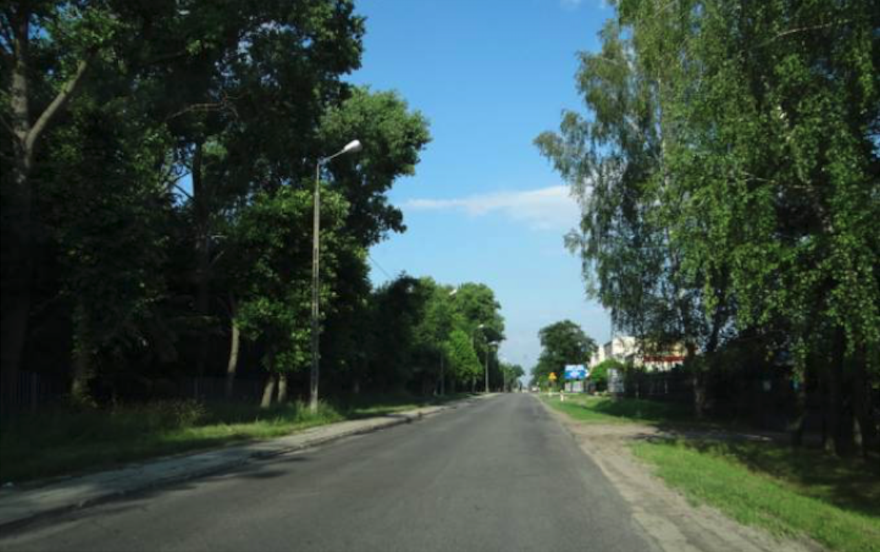 Tomaszewska Street leading to the airport. View towards the city center. 2012 year. Photo by Karol Placha Hetman