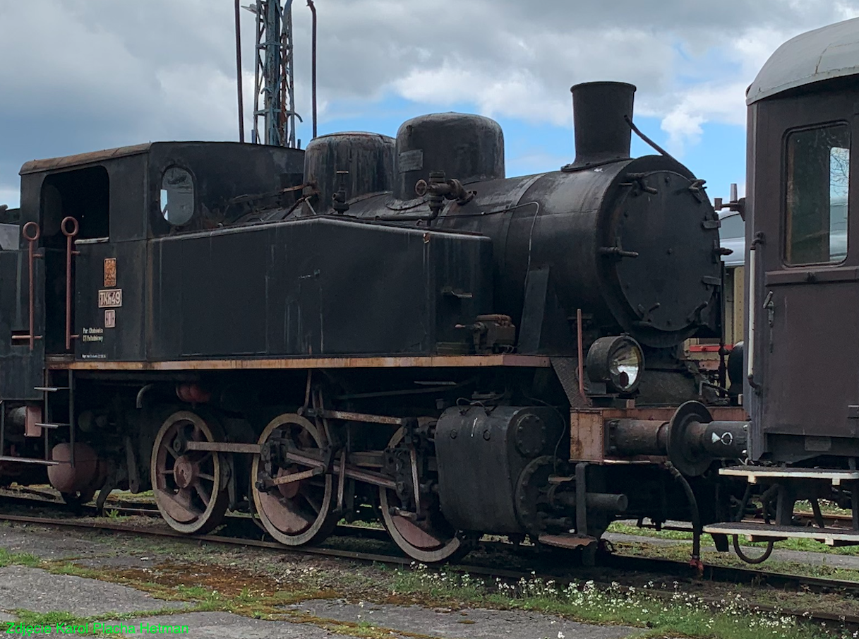 The train with a TKh49-1 steam locomotive. 2021 year. Photo by Karol Placha Hetman