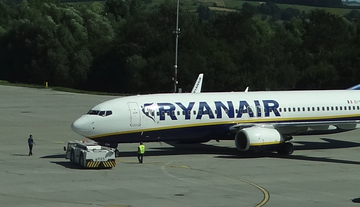 Heavy Schopf airport tractor. Pushes B.737. Cabin lowered. 2012 year. Photo by Karol Placha Hetman