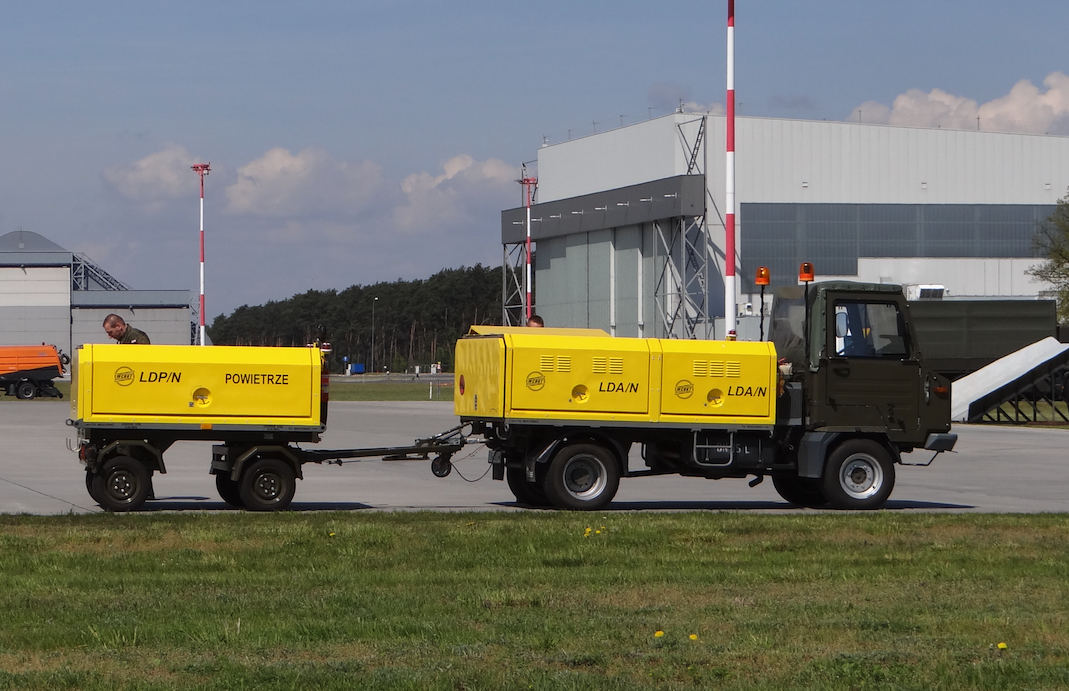 There is a nitrogen distributor on the car and an air distributor on the trailer. 2017 year. Photo by Karol Placha Hetman