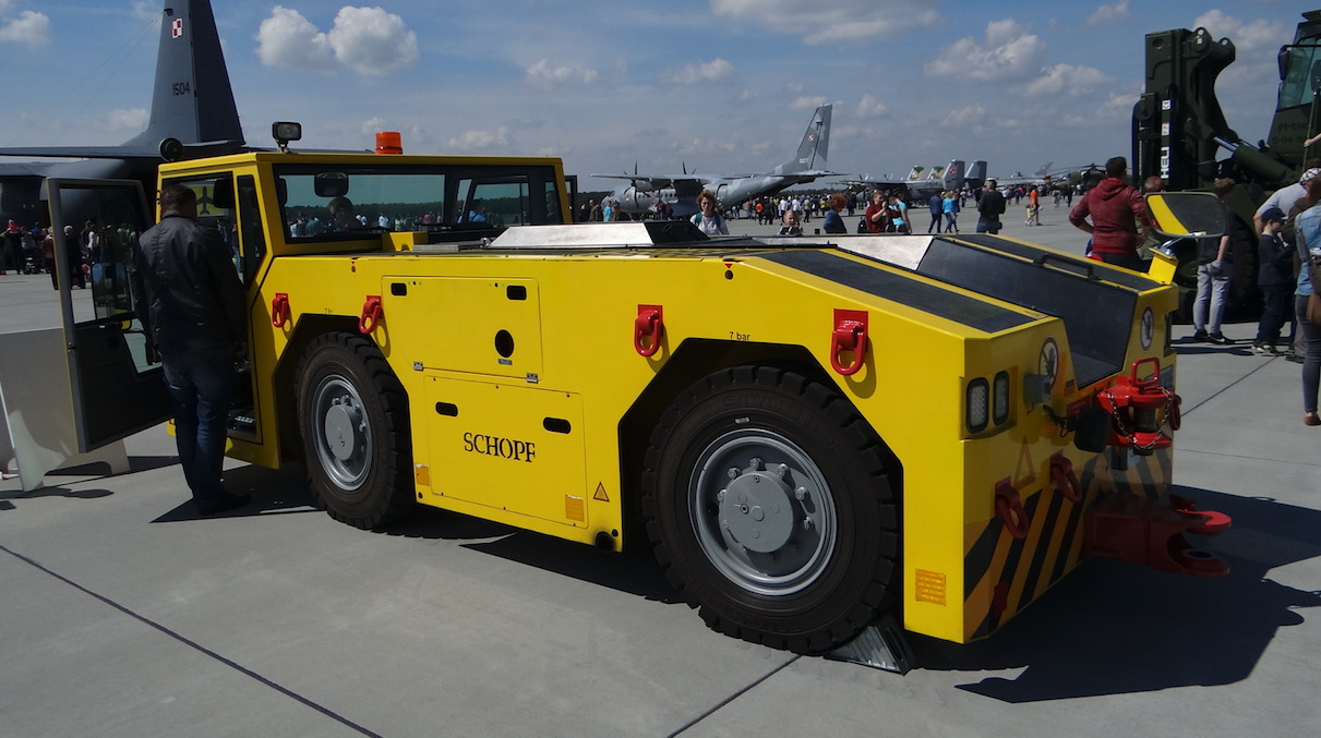 SCHOPF airport drawbar tractor with lifted cabin 2017 year. Photo by Karol Placha Hetman