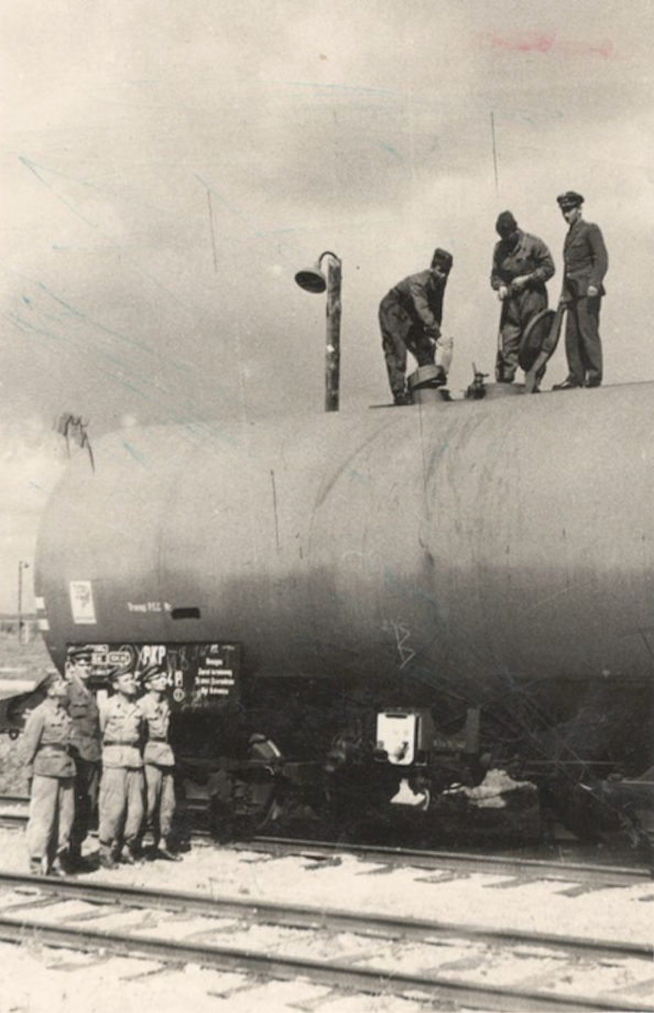 Unloading a railway tanker with aviation fuel. Krzesiny airport 1959. Photo of LAC