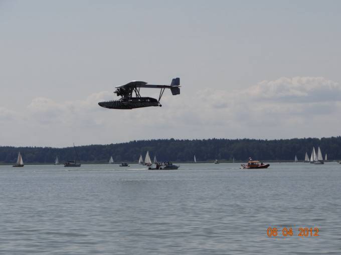 Sikorsky S-38 flying boat over Lake Niegocin. 2012 year. Photo by Karol Placha Hetman